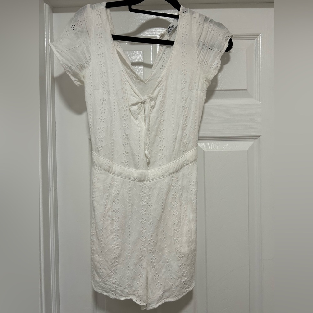 Woman’s Hollister white eyelet romper in size small.